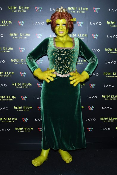 5. Fiona from "Shrek" (2018) It's not easy being green — Klum piled on the prosthetics for this awesome outfit, even arriving at her party in an onion carriage. Tom Kaulitz, meanwhile, joined her dressed as the movie's titular ogre.