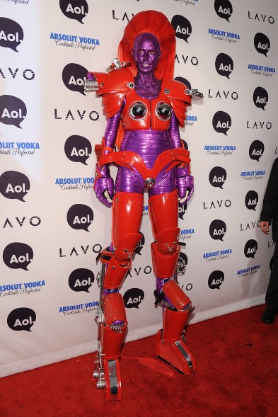 9. Robot (2010) Klum covered herself in purple glitter and even wore red contacts to complete her costume. We're still not sure how she managed to walk on those stilts.