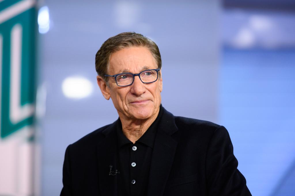 Photo of Maury Povich in black shirt.